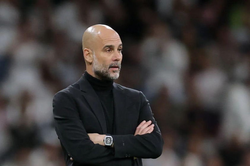 Pep Guardiola than vãn về lịch thi đấu dày đặc của Man City (Ảnh: Getty).